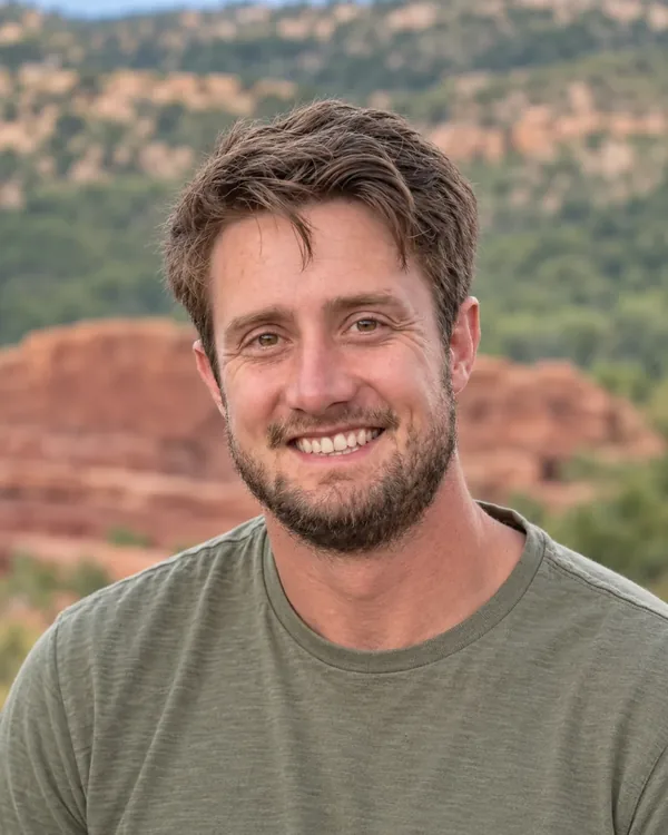 Josh Jensen smiling outdoors